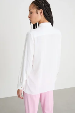 Blusa con applicazione a fiore - Bianco