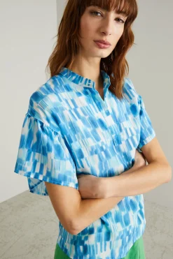 Blusa con chiusura a polo - Turchese