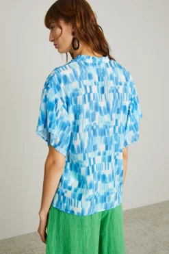 Blusa con chiusura a polo - Turchese