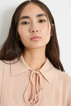 Blusa con maniche a sbuffo - Beige