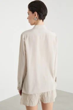 Blusa con tasche multiple - Beige