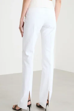 Pantalone aderente con spacco al fondo - Bianco