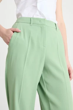 Pantalone con applicazione floreale - Verde