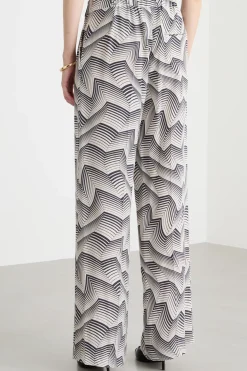 Pantalone dalla linea morbida a pois - Bianco Nero