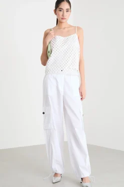 Top in rete con paillettes ricamate - Bianco