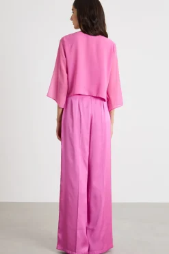 Tuta in raso tecnico con coprispalle - Fuxia